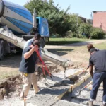 Crew doing concrete work in Philadelphia near historic site